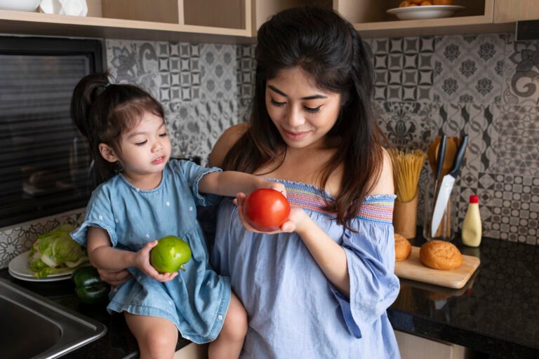 medium-shot-mother-girl-kitchen