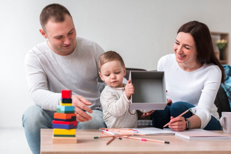 front-view-mother-father-with-child-home